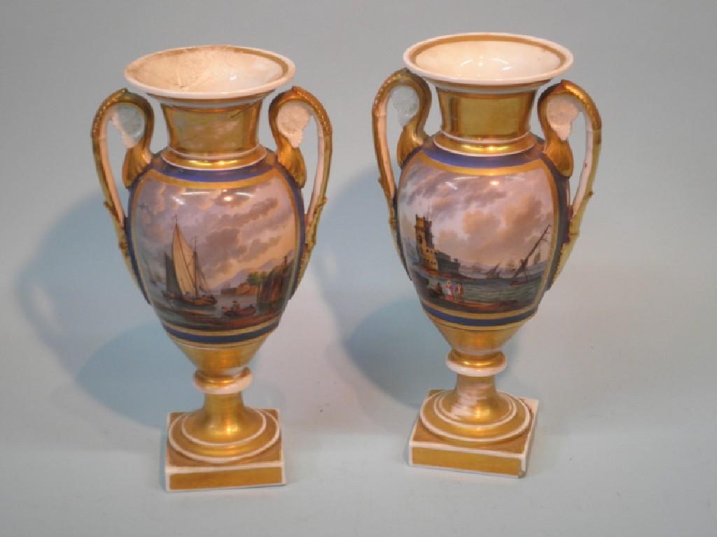 Appraisal: A pair of Paris porcelain two handled vases each decorated