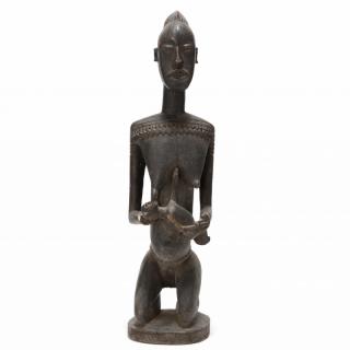 Appraisal: Nigeria Yoruba Nursing Female Figure carved wood modeled in a