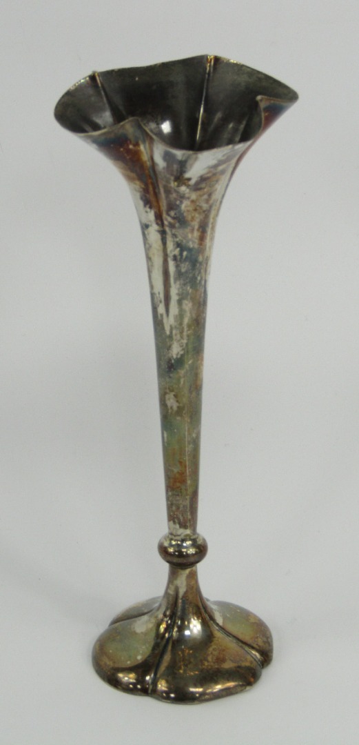 Appraisal: A loaded silver bud vase of flared quatrefoil form Pearce