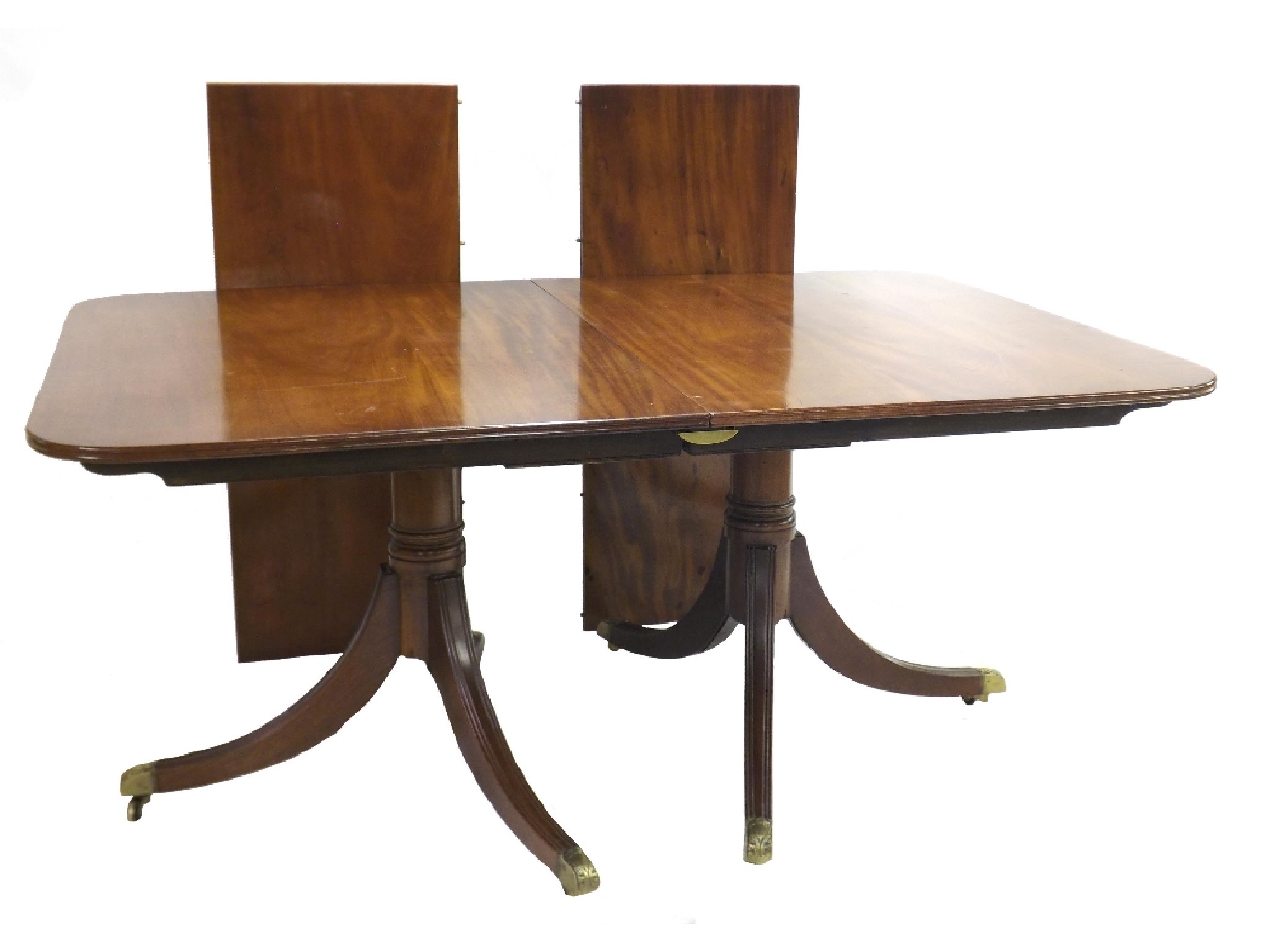 Appraisal: Georgian style flamed mahogany twin pillar extending dining table with