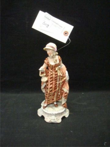 Appraisal: Porcelain figure of woman in hat w crossed sword mark