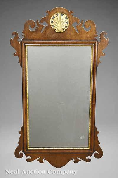 Appraisal: A Pair of Antique Chippendale-Style Parcel Gilt and Mahogany Looking