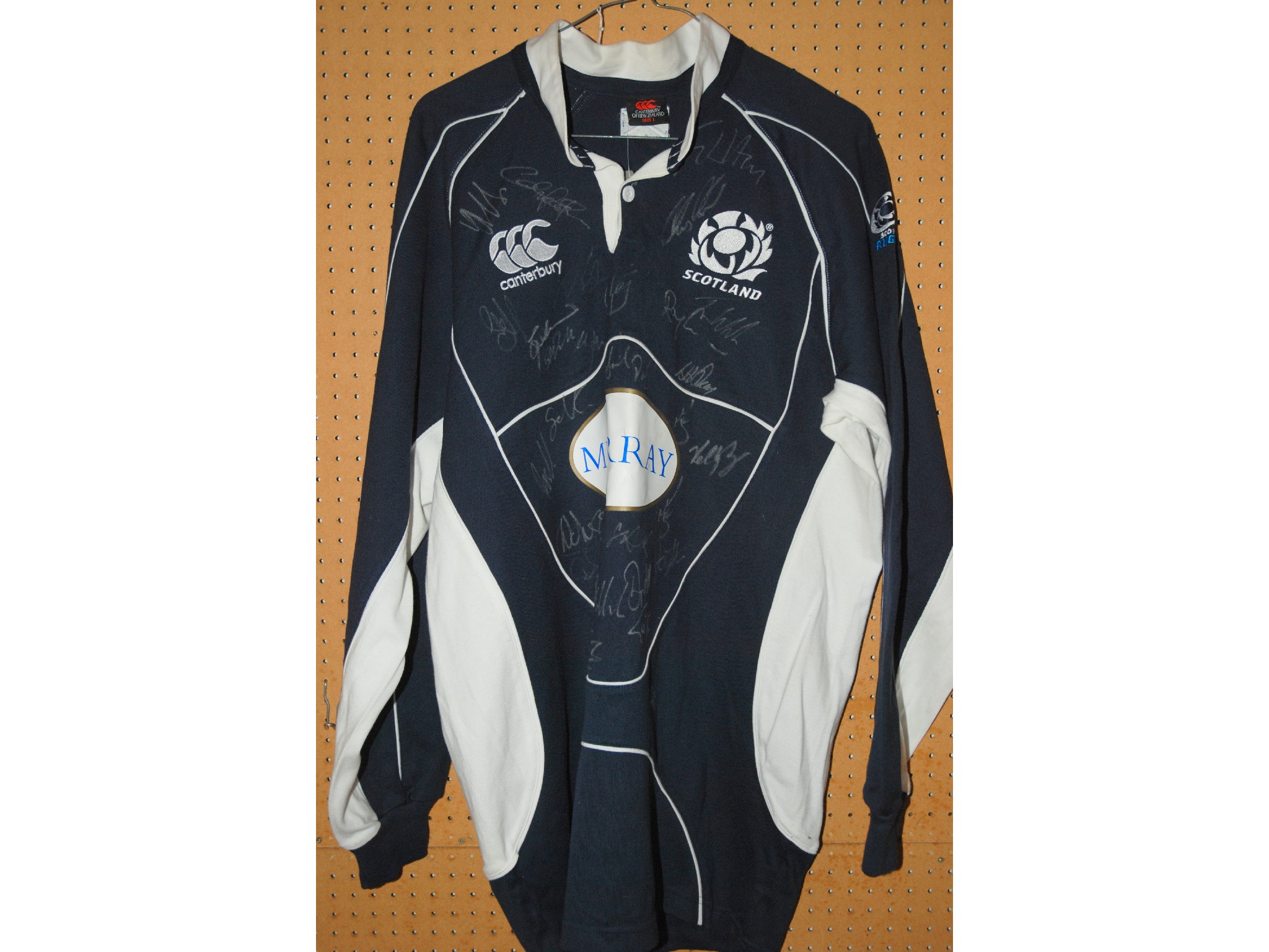 Appraisal: A replica Scotland International rugby shirt bearing numerous player autographs