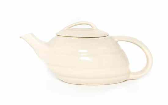 Appraisal: A Bauer Glazed Pottery Ringware Tea Pot having a cream