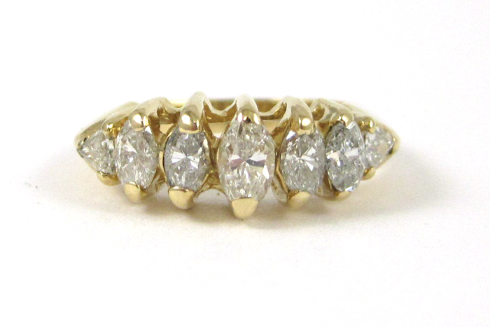 Appraisal: DIAMOND AND FOURTEEN KARAT GOLD RING set with five marquise-cut