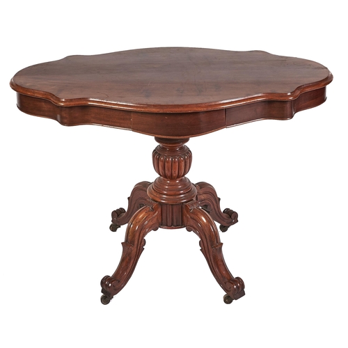 Appraisal: A serpentine mahogany loo table th c fitted with a