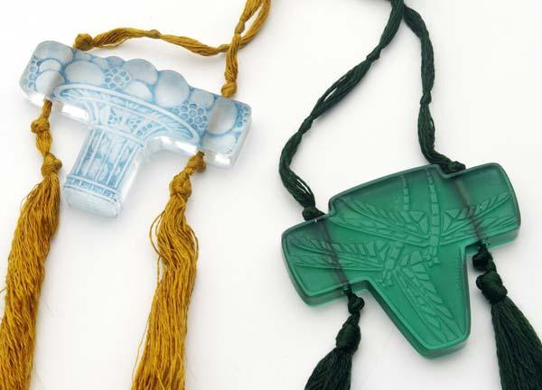 Appraisal: RENE LALIQUE Two pendants Libellules in dark green and Panier