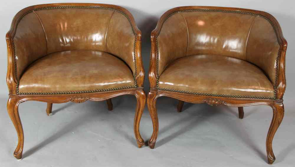 Appraisal: PAIR OF GEORGE III STYLE MAHOGANY LEATHER TUB CHAIRS each