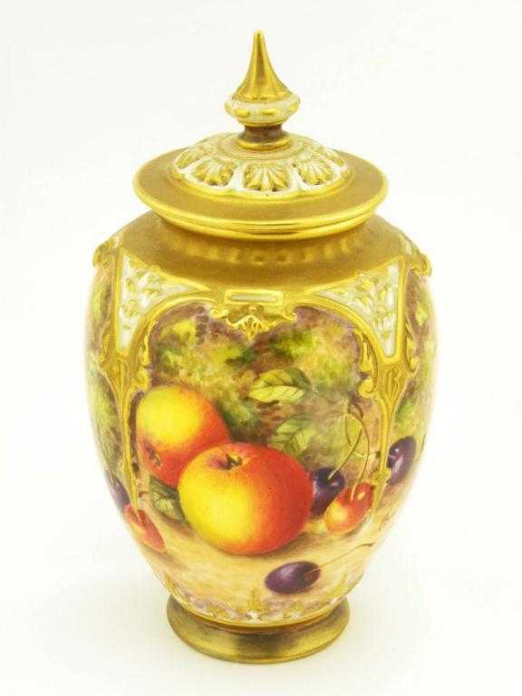 Appraisal: A ROYAL WORCESTER VASE AND COVER the lobed and shouldered