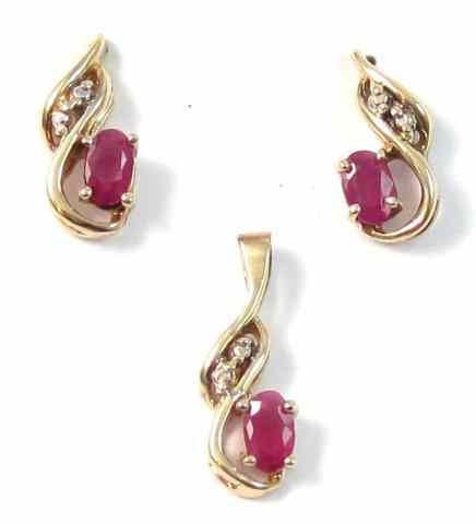 Appraisal: THREE ARTICLES OF RUBY JEWELRY including a pair of earrings