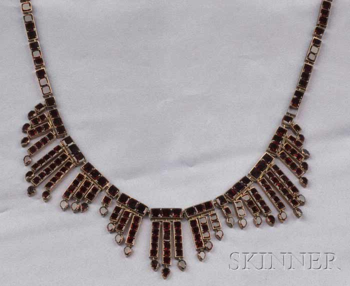 Appraisal: Garnet Fringe Necklace set with step-cut garnets suspending a flexible