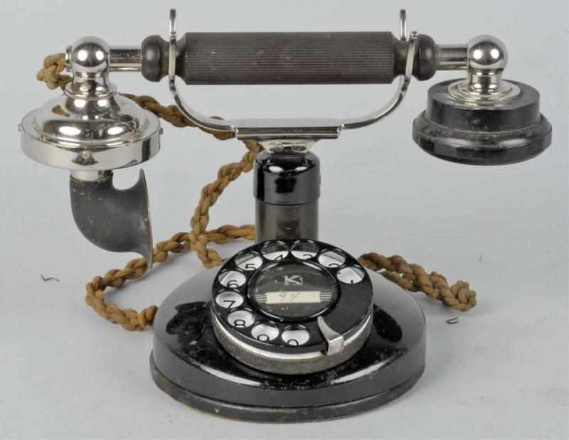 Appraisal: Kellogg Dial Grab-a-Phone Telephone Description Circa Black paint nickel cradle