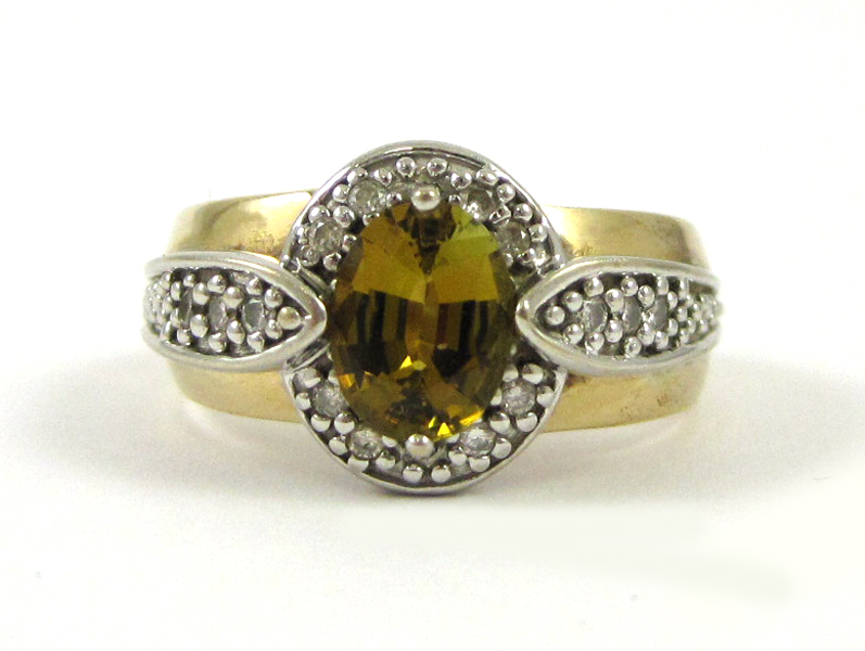 Appraisal: YELLOW TOPAZ AND FOURTEEN KARAT GOLD RING The yellow and