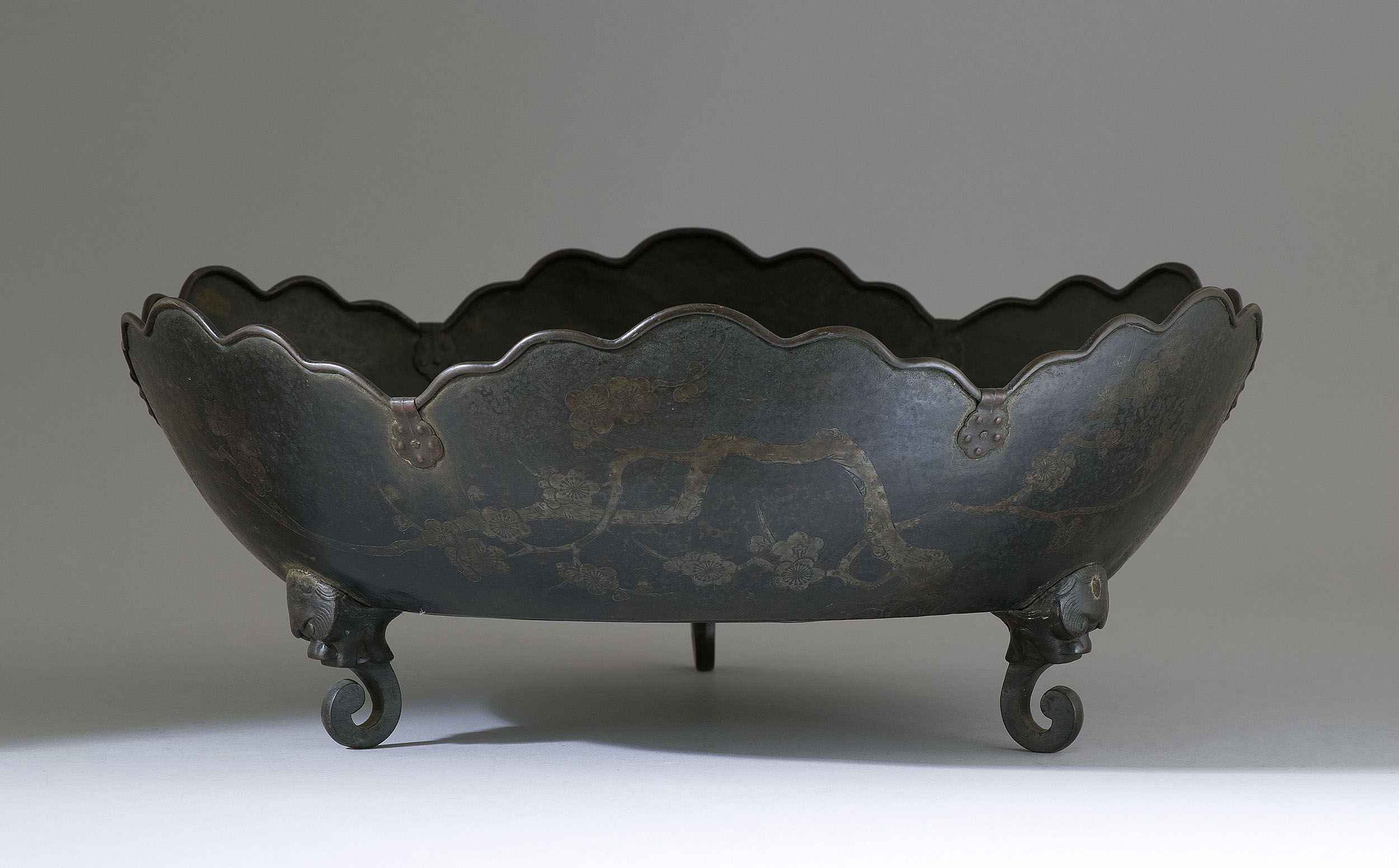 Appraisal: BRONZE BOWL Edo PeriodWith three-footed mask-design base and engraved and