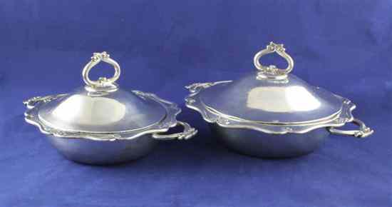 Appraisal: A graduated pair of early th century silver plated White