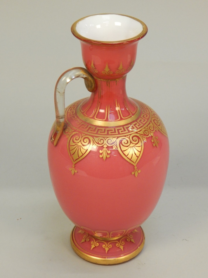 Appraisal: A Victorian pink opaque glass ewer with gilt decoration cm