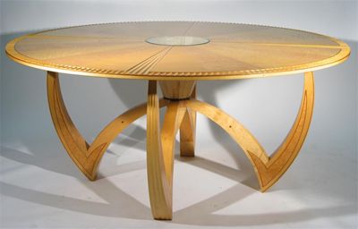 Appraisal: A maple centre table by Angus Ross the circular top