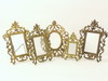 Appraisal: FRAMES - Circa five gilded iron rocco style standing photo