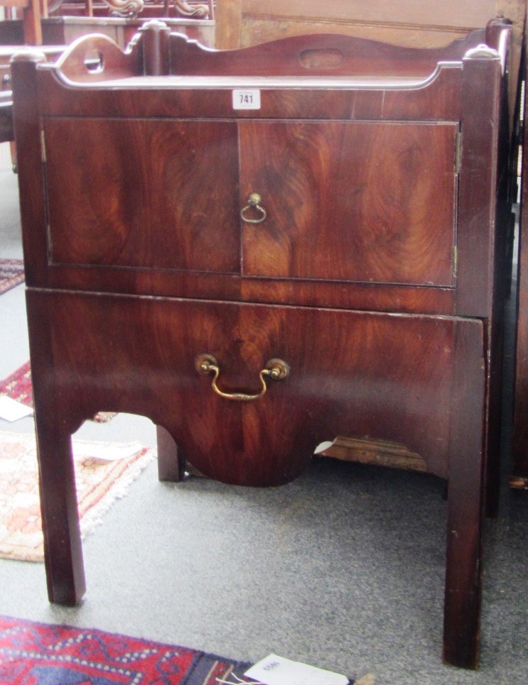 Appraisal: A George III mahogany tray top night commode with pair