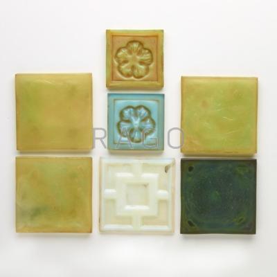 Appraisal: TIFFANY STUDIOS Seven assorted Favrile glass tiles Unmarked Five sq