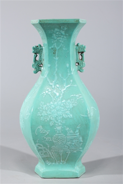 Appraisal: Chinese turquoise glazed porcelain vase with molded handles and floral