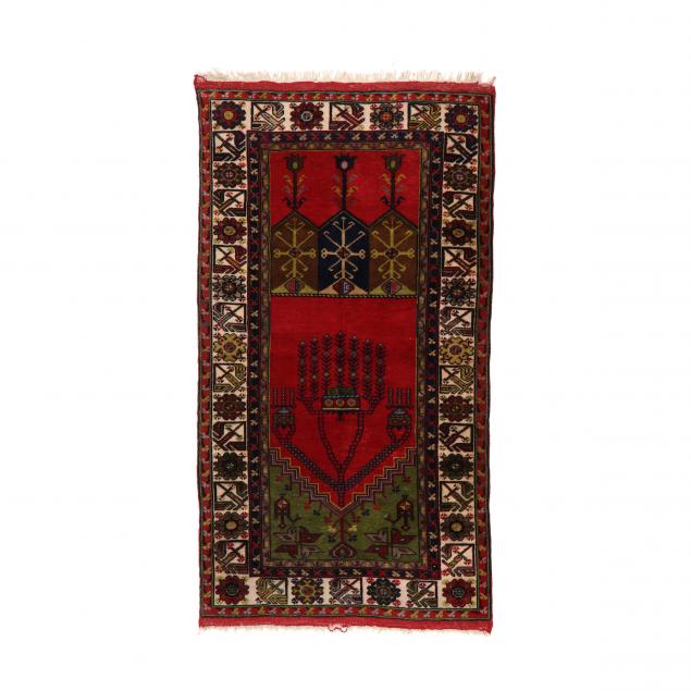 Appraisal: TURKISH RUG Red and green field beige border with repeating