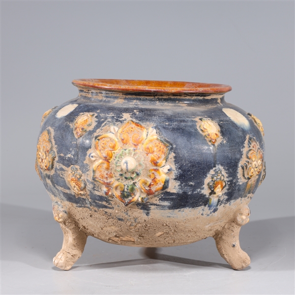 Appraisal: Chinese sancai glazed tripod ceramic vessel with molded designs to