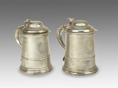 Appraisal: A George II tankard of tapering form with a skirted