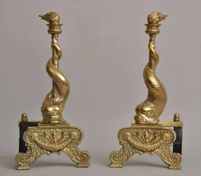 Appraisal: PAIR OF BAROQUE-STYLE BRASS DOLPHIN-FORM CHENETS Each stem with flambeau