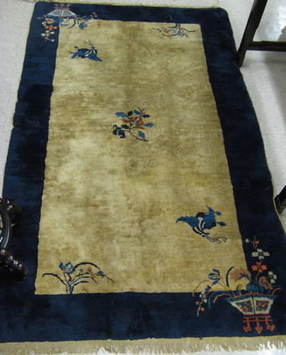 Appraisal: THREE SEMI-ANTIQUE PEKING AREA RUGS hand knotted floral designs on