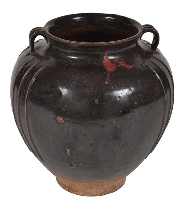 Appraisal: AN EARLY LARGE CHINESE BLACK BROWN-GLAZED RIBBED POT with two