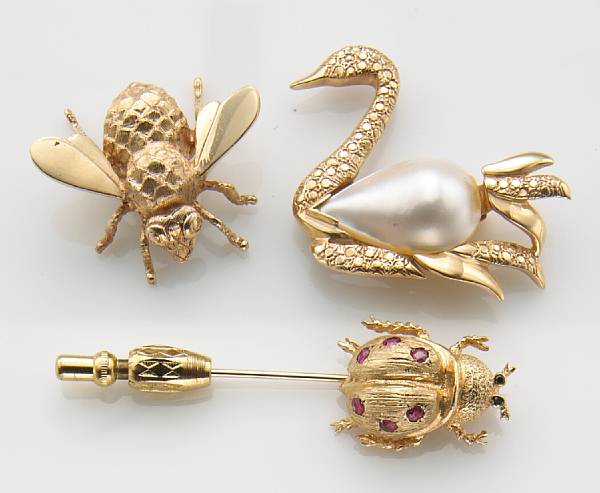 Appraisal: A collection of three gem-set and k gold brooches comprising