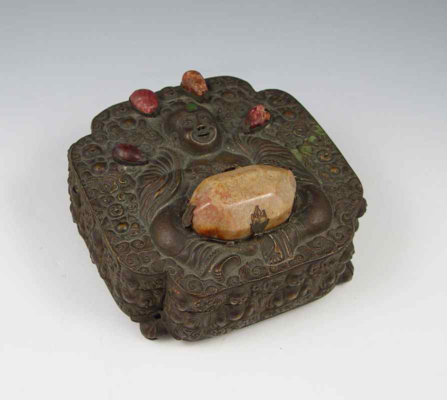 Appraisal: CHINESE BRONZE BUDDHA STONE INLAY BOX Cast bronze hinged box