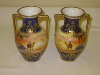 Appraisal: A PAIR OF NORITAKE PORCELAIN VASES of baluster form with