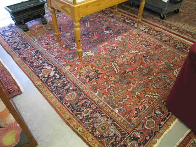 Appraisal: Heriz Persian Handmade Room Size Rug overall stylized floral salmon