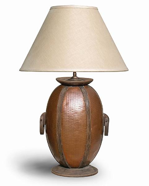 Appraisal: A French hammered copper and oak lamp circa The melon