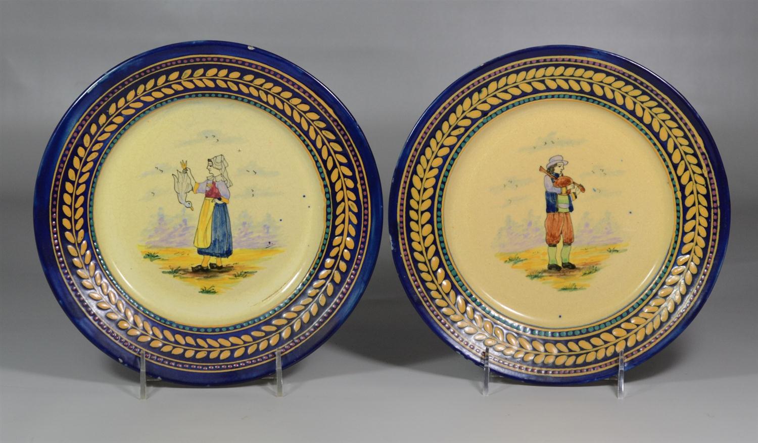 Appraisal: Pair of Quimper plates peasant girl boy - dia minor