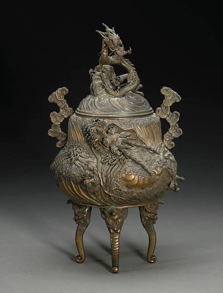 Appraisal: A patinated bronze footed urn with cover Meiji Period th