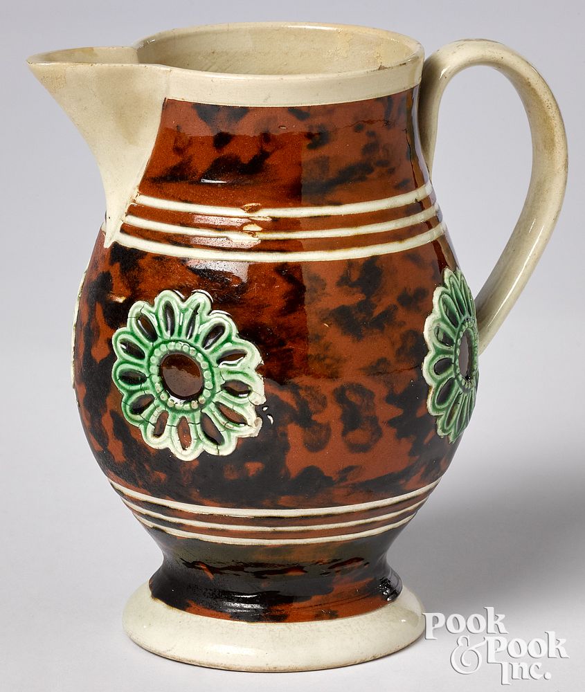 Appraisal: Mocha pitcher Mocha pitcher with brown speckled glaze and applied