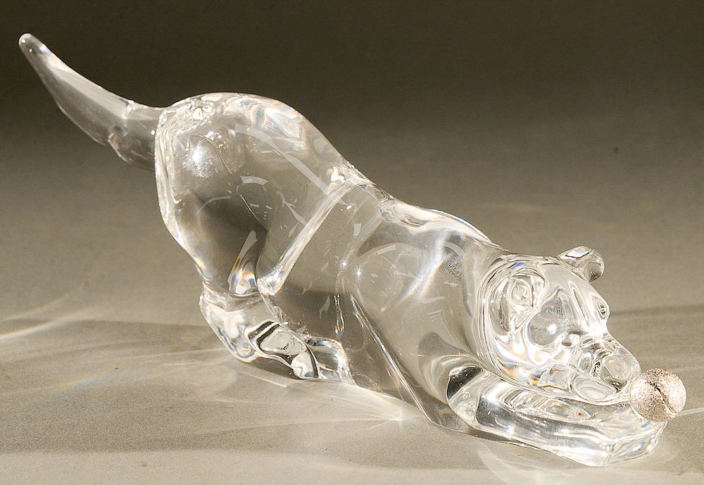 Appraisal: Steuben glass dog with silver ball Playful Pup crystal sculpture