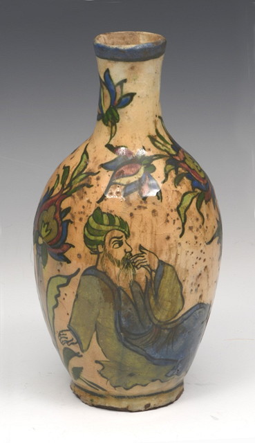 Appraisal: AN ISNIK POTTERY VASE with polychrome glazed figure decoration cm