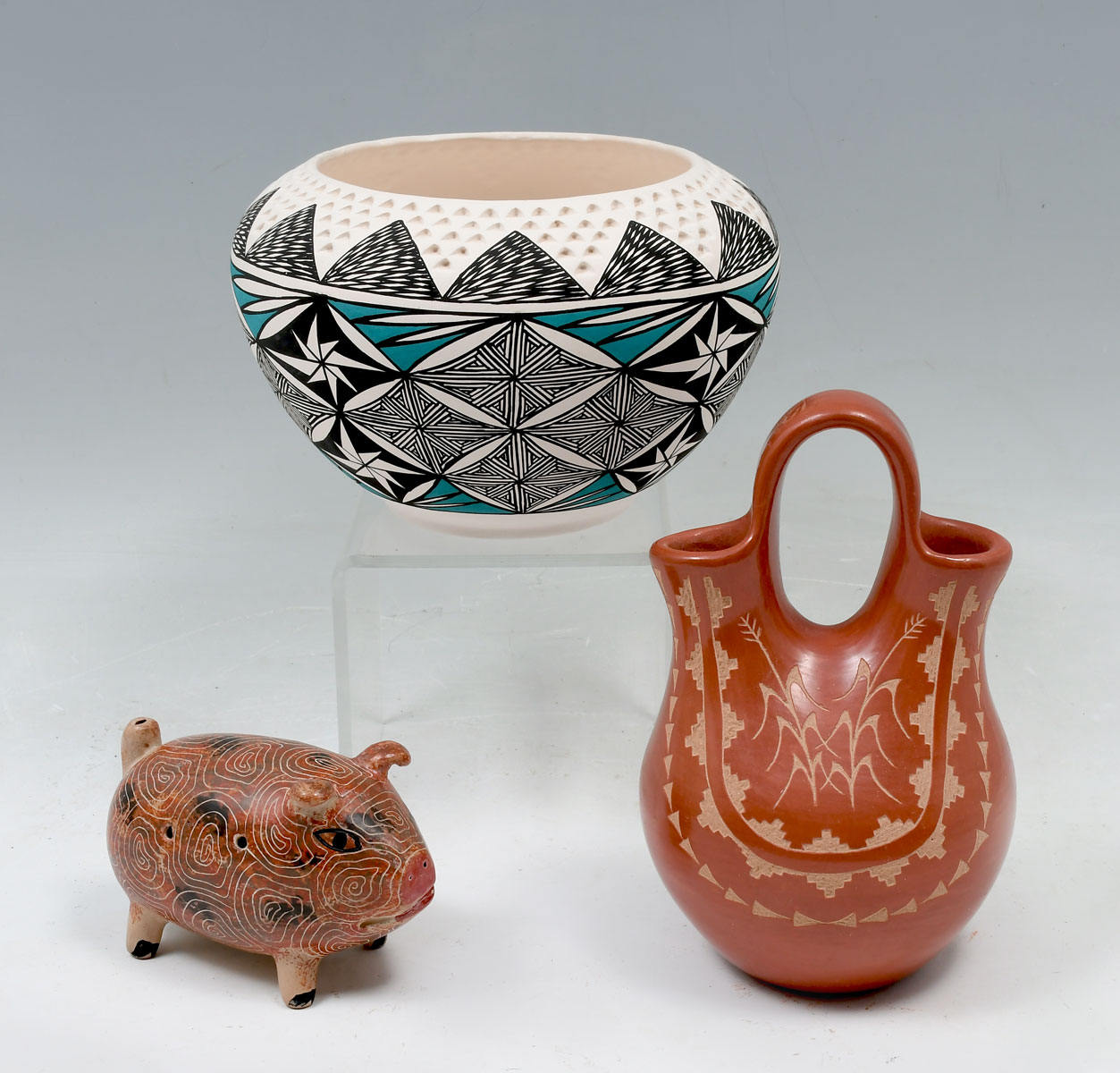 Appraisal: PIECE NATIVE AMERICAN INDIAN POTTERY Comprising - Polychromed pig form