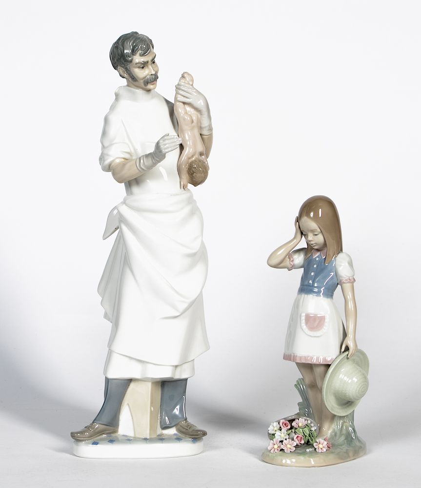 Appraisal: Two Lladro Signed Porcelain Figurines Lladro Spanish founded A group