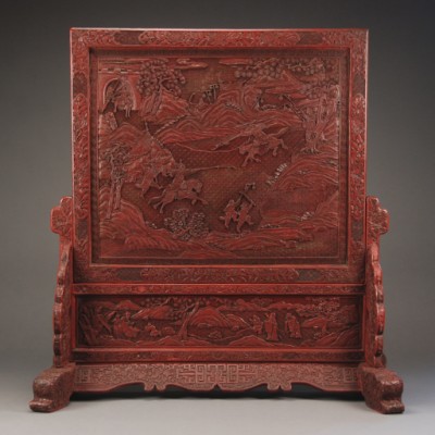 Appraisal: Square panel carved with detailed scene of warriors on horseback