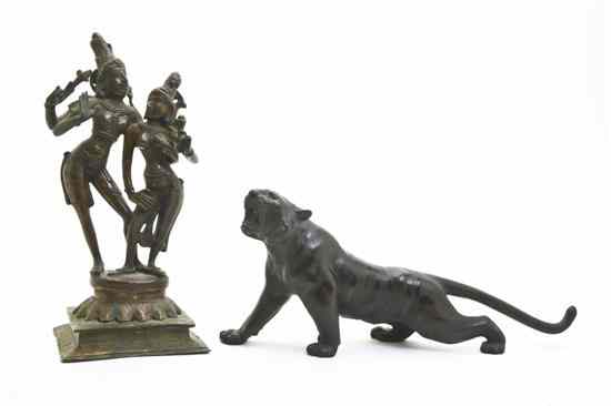 Appraisal: Two Bronze Figures depicting a Hindu deity and a tiger