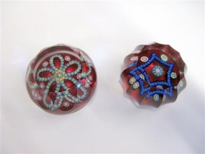 Appraisal: Two Perthshire patterned millefiori ruby flash faceted paperweightsone with 'n'