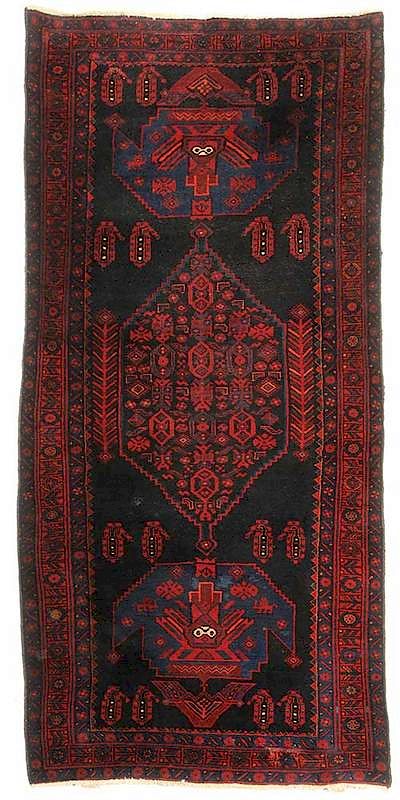 Appraisal: Persian Dark Red Runner late th century central stepped medallion