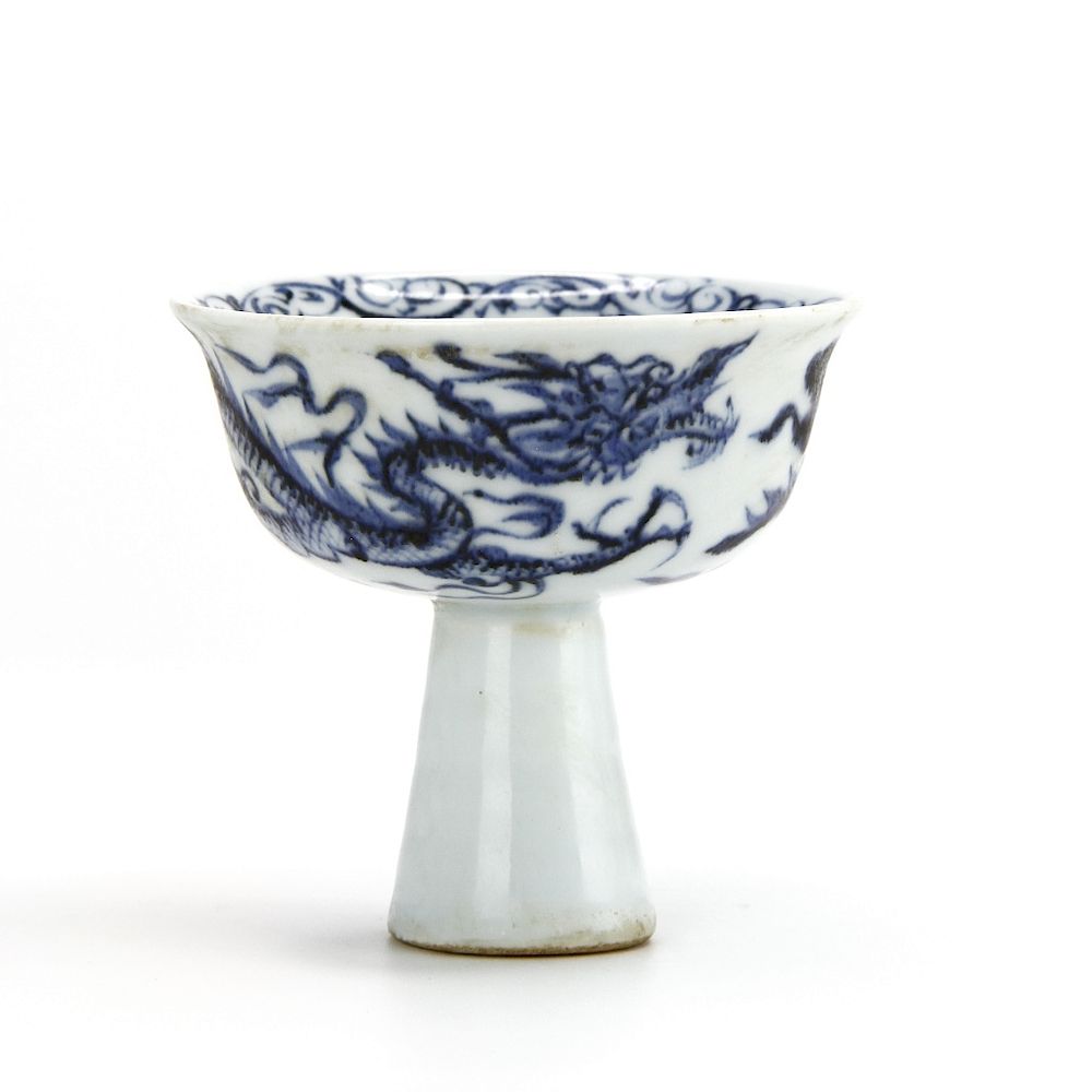 Appraisal: Blue and White Stem Bowl The curved rounded sides rising