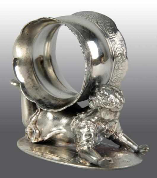 Appraisal: Girl Lies on Tummy Napkin Holder Description By Wilcox Silverplate