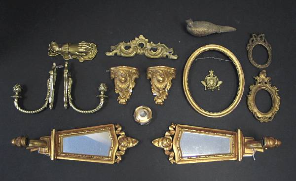 Appraisal: An assembled group of brass giltwood or compositions decorations th